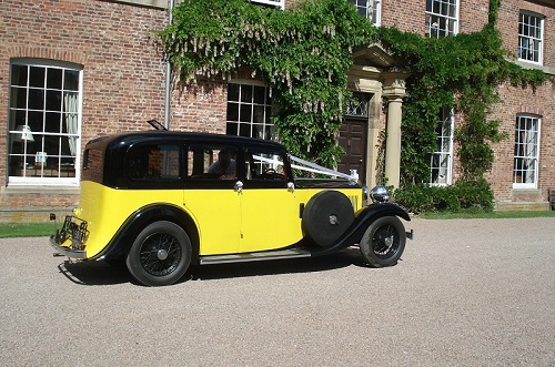 A wedding car at the door